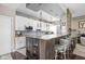 Modern kitchen with granite counters, stainless steel appliances, and a breakfast bar at 25 E 40Th St # Apt 1B/D, Indianapolis, IN 46205