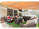 Covered patio with comfortable seating, a coffee table, and potted plants at 25 E 40Th St # Apt 1B/D, Indianapolis, IN 46205