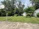 Backyard featuring basketball hoop, storage shed, and garden area at 2615 Alexandria Pike, Anderson, IN 46012