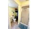 Functional bathroom features a shower and toilet with decor at 2615 Alexandria Pike, Anderson, IN 46012