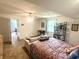 Upstairs bedroom offers seating area, ceiling fan and great natural light at 2615 Alexandria Pike, Anderson, IN 46012