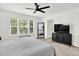 Bright main bedroom featuring modern fixtures, neutral colors, and large window at 2720 Guilford Ave, Indianapolis, IN 46205