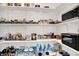 A well-stocked pantry with organized shelving, showcasing various food items and appliances at 2720 Guilford Ave, Indianapolis, IN 46205