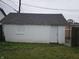 Spacious one-car garage offering secure parking and storage space, set in a well-maintained backyard at 2824 Brown St, Anderson, IN 46016