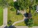 Aerial view of a home with a driveway and lawn at 2906 E 65Th St, Indianapolis, IN 46220