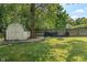Fenced backyard with shed and lawn at 2906 E 65Th St, Indianapolis, IN 46220