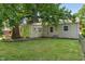Backyard of a home with lawn and siding at 2906 E 65Th St, Indianapolis, IN 46220
