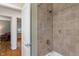 A bathroom with a tub, tiled walls, and good natural light at 2906 E 65Th St, Indianapolis, IN 46220