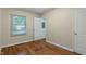 A bedroom with wood floors, neutral paint, and good natural light at 2906 E 65Th St, Indianapolis, IN 46220