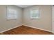 A bedroom with wood floors, neutral paint, and good natural light at 2906 E 65Th St, Indianapolis, IN 46220