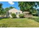 Charming single-story home with a deck and a well-manicured lawn at 2906 E 65Th St, Indianapolis, IN 46220