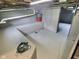 Spacious unfinished basement with painted concrete walls, exposed ceiling, and bright lighting at 3015 Mckinley Ave, Columbus, IN 47201
