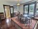 Beautiful dining room featuring a large table, ample seating, and natural light from a large window at 3015 Mckinley Ave, Columbus, IN 47201