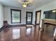 Inviting living room with a fireplace, hardwood floors, and an abundance of natural light at 3015 Mckinley Ave, Columbus, IN 47201