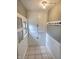 Mudroom featuring storage cabinets, hooks, and natural light from a window at 3015 Mckinley Ave, Columbus, IN 47201