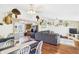 Open-concept living area with hardwood floors, neutral paint, and comfortable seating at 4511 W 300 S, Anderson, IN 46011