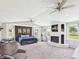 Expansive main bedroom with vaulted ceilings, a fireplace, accent wall, and views of the open countryside at 4511 W 300 S, Anderson, IN 46011