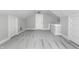 Finished attic space offers flexible use, featuring neutral carpeting and ample natural light at 4904 N Washington Blvd, Indianapolis, IN 46205