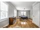 Spacious bedroom with hardwood floors, natural light, and neutral paint at 4904 N Washington Blvd, Indianapolis, IN 46205