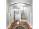 Welcoming foyer with stairs and a view through to an additional room at 4904 N Washington Blvd, Indianapolis, IN 46205