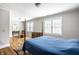 Large main bedroom featuring hardwood floors, lots of sunlight, and neutral colors at 4904 N Washington Blvd, Indianapolis, IN 46205