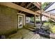 Backyard deck with stairs and access door underneath at 5240 Windridge Dr, Indianapolis, IN 46226