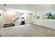Basement with carpeted floors, stairs, and light colored walls at 5240 Windridge Dr, Indianapolis, IN 46226