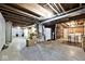 Spacious unfinished basement with overhead piping at 5240 Windridge Dr, Indianapolis, IN 46226