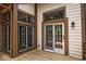 Exterior view of wooden deck with a sliding glass door that leads inside the house at 5240 Windridge Dr, Indianapolis, IN 46226