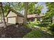 Charming single Gathering home featuring a brick and siding exterior with an attached two-car garage at 5240 Windridge Dr, Indianapolis, IN 46226
