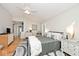 Main bedroom features a ceiling fan, light colored walls, and carpeted flooring at 5240 Windridge Dr, Indianapolis, IN 46226
