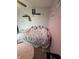 Cozy bedroom features plush carpet, a ceiling fan, and charming decor for a comfortable retreat at 6027 Moonseed Cir, Indianapolis, IN 46203
