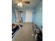 Bright bedroom with carpeted floor, neutral colors, and ample closet space; ideal for storage and organization at 6027 Moonseed Cir, Indianapolis, IN 46203