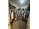 Spacious walk-in closet with ample storage space at 6027 Moonseed Cir, Indianapolis, IN 46203