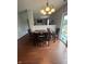 Dining area with a view of the backyard from the sliding glass door at 6027 Moonseed Cir, Indianapolis, IN 46203