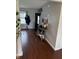 Inviting foyer with hardwood floors and neutral wall color at 6027 Moonseed Cir, Indianapolis, IN 46203