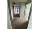 Hallway with carpeted floor and bedroom doorway at 6027 Moonseed Cir, Indianapolis, IN 46203