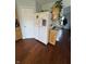 View of kitchen area with stainless steel refrigerator, and wood cabinets at 6027 Moonseed Cir, Indianapolis, IN 46203