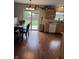 Open-concept kitchen with stainless steel appliances and a dining area at 6027 Moonseed Cir, Indianapolis, IN 46203