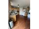 Spacious kitchen with stainless appliances, ample cabinet space, and hardwood flooring at 6027 Moonseed Cir, Indianapolis, IN 46203