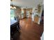 Eat-in kitchen featuring granite counters, stainless appliances, and wood cabinets at 6027 Moonseed Cir, Indianapolis, IN 46203