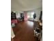 Bright living room offers hardwood flooring and a cheerful playroom atmosphere, creating a welcoming space at 6027 Moonseed Cir, Indianapolis, IN 46203