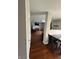 Open-concept living room features hardwood floors and neutral paint colors at 6027 Moonseed Cir, Indianapolis, IN 46203