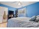 The bedroom has a window with natural light, nice hardwood floors and a double closet at 6120 E Southport Rd, Indianapolis, IN 46237