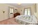 Inviting bedroom with natural light and a classic wooden dresser at 6851 Azalea Dr, Indianapolis, IN 46214