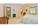 Bedroom with a view of the bathroom and multiple closets at 6851 Azalea Dr, Indianapolis, IN 46214