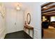 Inviting entryway featuring a classic console table, decorative mirror, and neutral decor at 6851 Azalea Dr, Indianapolis, IN 46214