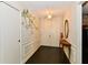 Welcoming entryway with detailed trim, elegant lighting, and a decorative wall mural at 6851 Azalea Dr, Indianapolis, IN 46214