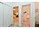 Hallway with doorways leading to the bedrooms and bathroom at 6851 Azalea Dr, Indianapolis, IN 46214