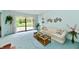 Cozy living room with a sliding glass door to the deck and decorative accents at 6851 Azalea Dr, Indianapolis, IN 46214